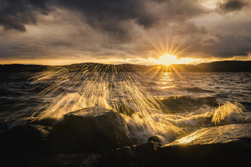 Sunset light and evening mood by the Jonsvatnet lake in Norway.