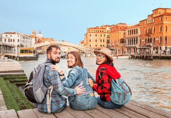 Fototapeta na wymiar Group of Tourists at Venice canal, Travel and vacation for friends in Italy and Europe concept