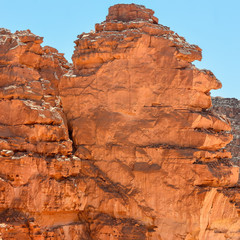 Rocks of multicolored sandstone in a colored canyon in the southeast of the Sinai Peninsula