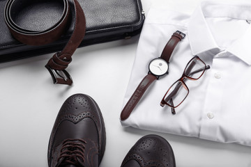 Stylish men's clothes with accessories on white background