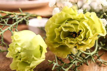 Bouquet of beautiful flowers on wooden table, closeup