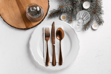 Beautiful Christmas table setting on white background