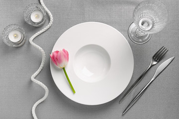 Beautiful festive table setting with floral decor