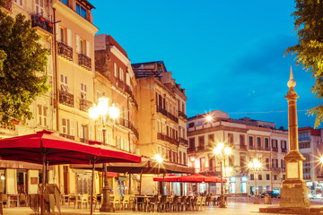 morning streets with lanterns and cafes in Cagliari Italy