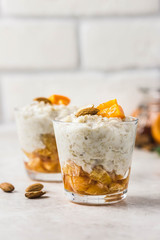 Overnight oats with citrus jam. Selective focus, space for text.