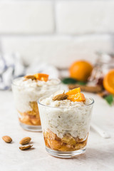 Overnight oats with citrus jam. Selective focus, space for text.