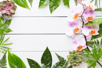 Beauty and fashion concept with spa set on pastel rustic wooden background.