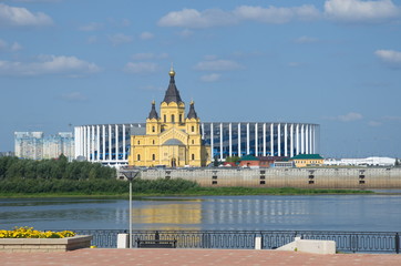 Nizhny Novgorod, Russia - August 19, 2018: Summer view of the Nizhnevolzhskaya embankment, Alexander Nevsky Cathedral and stadium "Nizhny Novgorod"