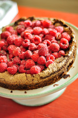 Delicious fresh raspberry chocolate cake with sugar on top. A tasty Finnish dessert for any celebration in Finland