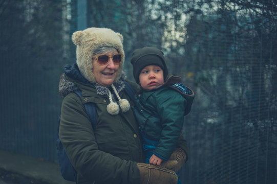 Toddler and grandmother outdoors in winter