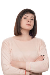 Feminist portrait. The girl looks arrogantly. Portrait of a strict brunette. Woman confident on...