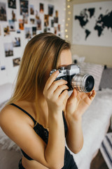 Girl - photographer in black bra.