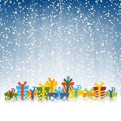 christmas presents in front of snow fall