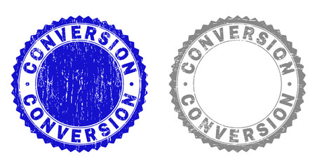 Grunge CONVERSION stamp seals isolated on a white background. Rosette seals with grunge texture in blue and gray colors. Vector rubber stamp imitation of CONVERSION text inside round rosette.
