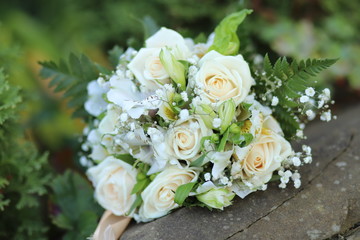 bouquet with roses on the ground