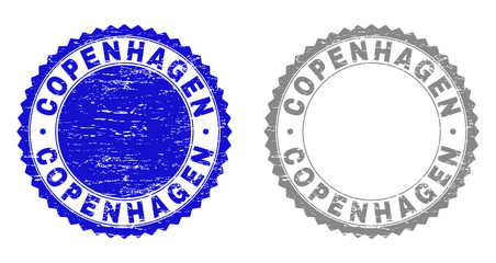 Grunge COPENHAGEN stamp seals isolated on a white background. Rosette seals with distress texture in blue and grey colors. Vector rubber overlay of COPENHAGEN tag inside round rosette.