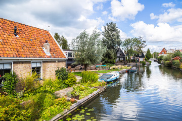 Fototapeta na wymiar Amsterdam houses on the canals