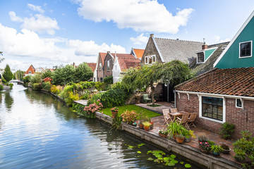Fototapeta na wymiar Amsterdam houses on the canals