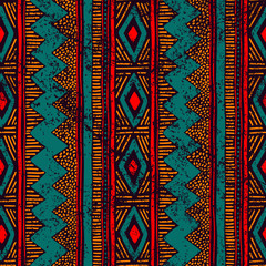 Seamless ethnic ornament. Aztec and tribal motifs. Ornament drawn by hand. Blue, red and orange colors. Vertical lines. Print for your textiles. Vector illustration.