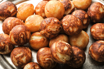donut balls on metal tray