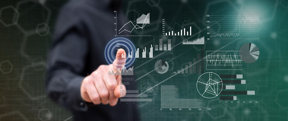 Man touching a financial analysis concept