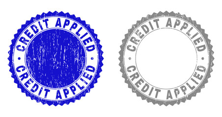 Grunge CREDIT APPLIED stamp seals isolated on a white background. Rosette seals with grunge texture in blue and gray colors. Vector rubber stamp imitation of CREDIT APPLIED tag inside round rosette.