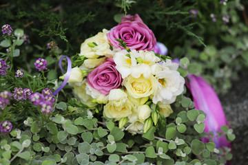 bouquet with roses on the ground