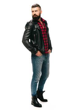 bearded man posing in black leather jacket isolated on white