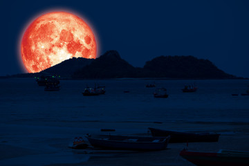 super blood moon back on silhouette island sea on night sky