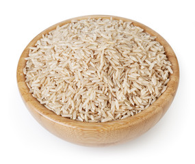 Brown rice in wooden bowl isolated on white background with clipping path