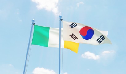 South Korea and Ireland, two flags waving against blue sky. 3d image
