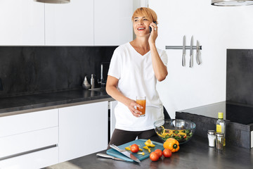 Attractive woman cooking lunch