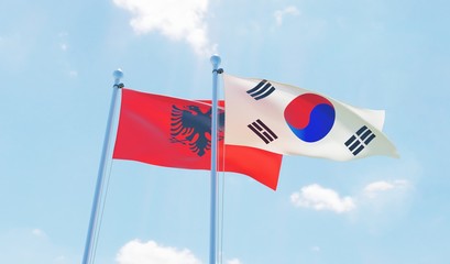 South Korea and Albania, two flags waving against blue sky. 3d image
