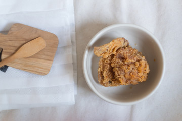 Fried chicken wing in white bowl