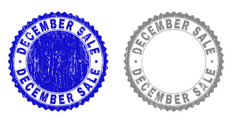 Grunge DECEMBER SALE stamp seals isolated on a white background. Rosette seals with grunge texture in blue and grey colors. Vector rubber stamp imitation of DECEMBER SALE tag inside round rosette.
