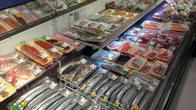 Fresh seafood on the counter of the supermarket at the Kuromon Market. Nipponbashi, Chuo ward, Osaka