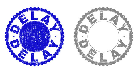 Grunge DELAY stamp seals isolated on a white background. Rosette seals with grunge texture in blue and grey colors. Vector rubber stamp imprint of DELAY tag inside round rosette.
