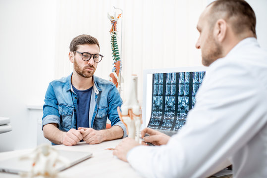 Man with sad emotions during the medical consultation at the therapist office - Powered by Adobe