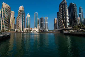 Fototapeta na wymiar Dubai, United Arab Emirates - October, 2018: Skycrapers at Dubai Marina. Dubai marina at sunny day