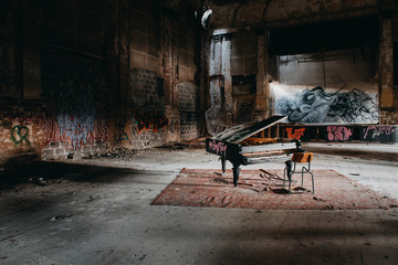 An old piano within a abondoned place