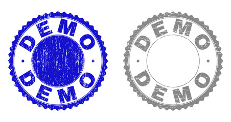Grunge DEMO stamp seals isolated on a white background. Rosette seals with grunge texture in blue and gray colors. Vector rubber stamp imprint of DEMO label inside round rosette.