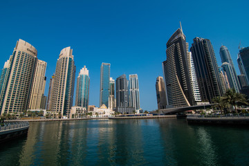 Fototapeta na wymiar Dubai, United Arab Emirates - October, 2018: Skycrapers at Dubai Marina. Dubai marina at sunny day