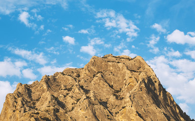 top of the mountain against the blue sky