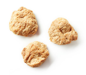 Heap of soya chunks isolated on white, from above