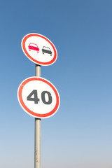 Speed limitation road sign. Overtaking prohibition road sign. Traffic sign.