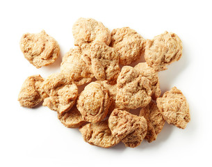 Heap of soya chunks isolated on white, from above