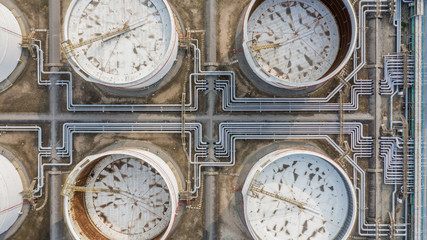 Tank farm or oil terminal for storage of oil and petrochemical products, Aerial view.