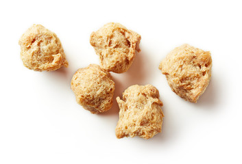 Heap of soya chunks isolated on white, from above