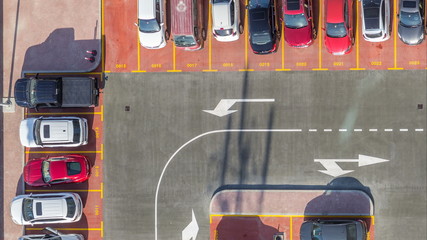 Car parking lot viewed from above timelapse, Aerial view