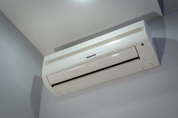 Air conditioner on the wall background.